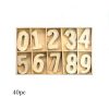 Mini houten nummers H.3,5cm c.a.40st